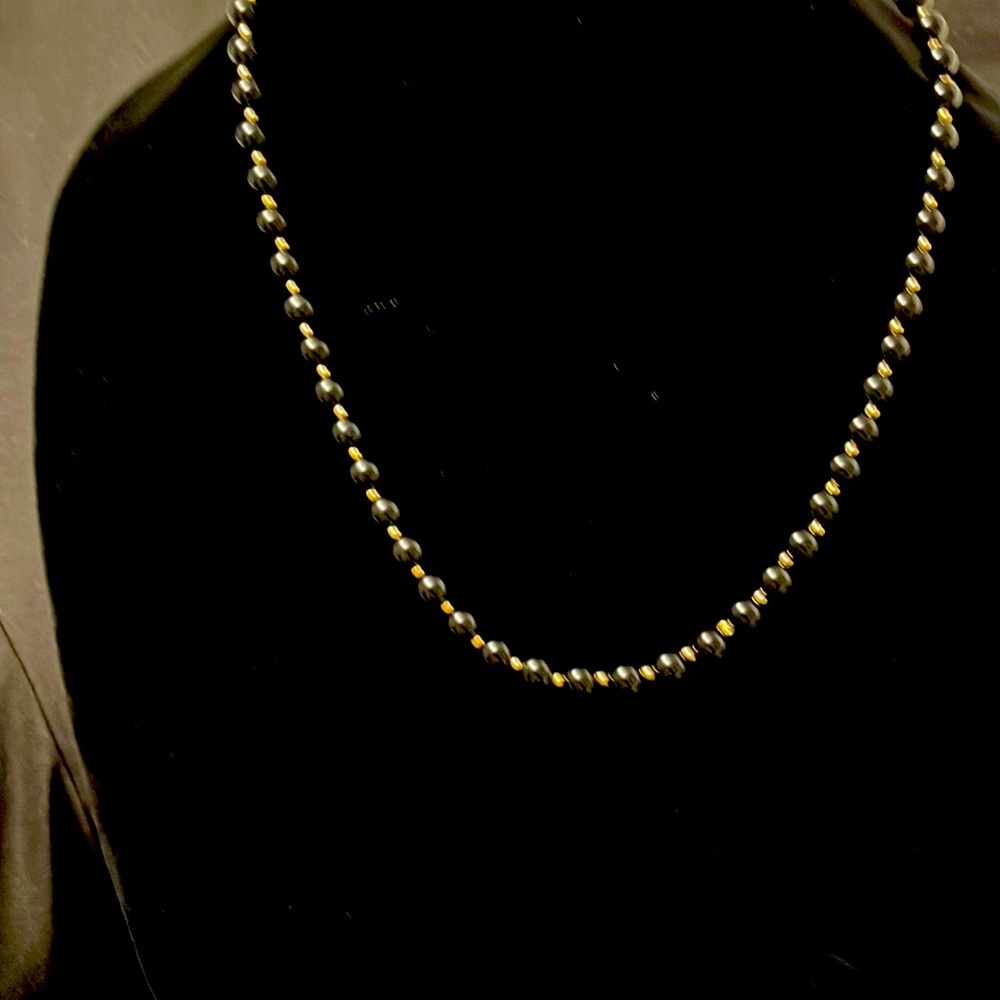 Black onyx and 10 karat gold necklace